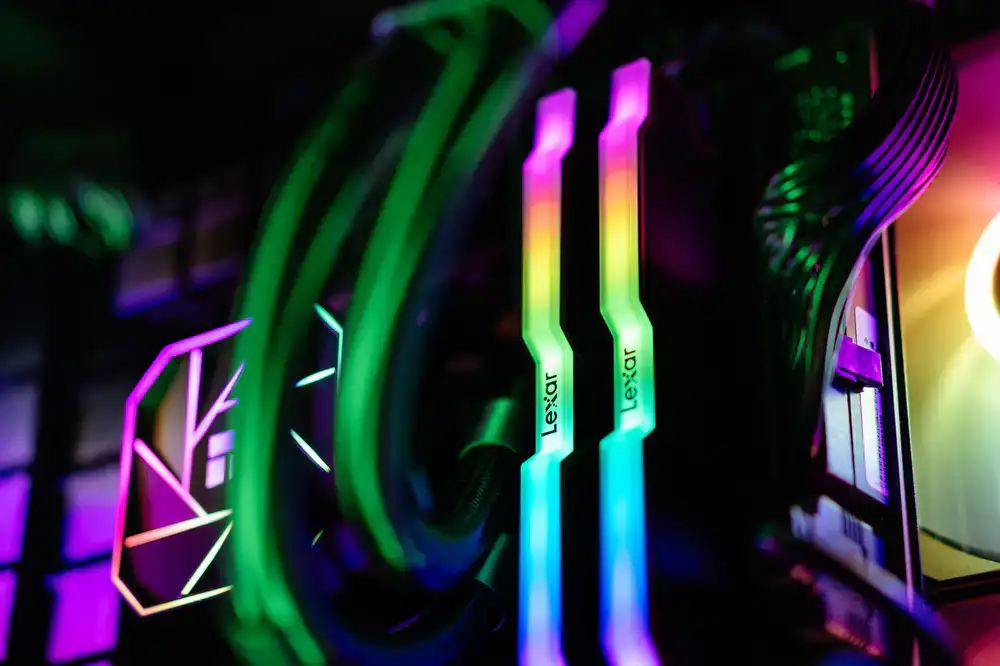 Rows of illuminated gaming PCs