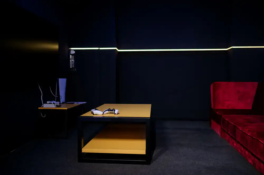 Comfortable console gaming area with large displays